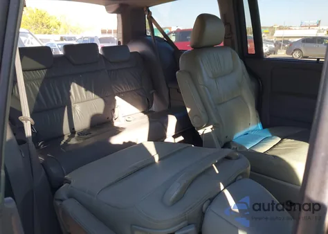 2010 Honda Odyssey Ex-L z USA, uszkodzony, nr VIN 5FNRL3H70AB029048